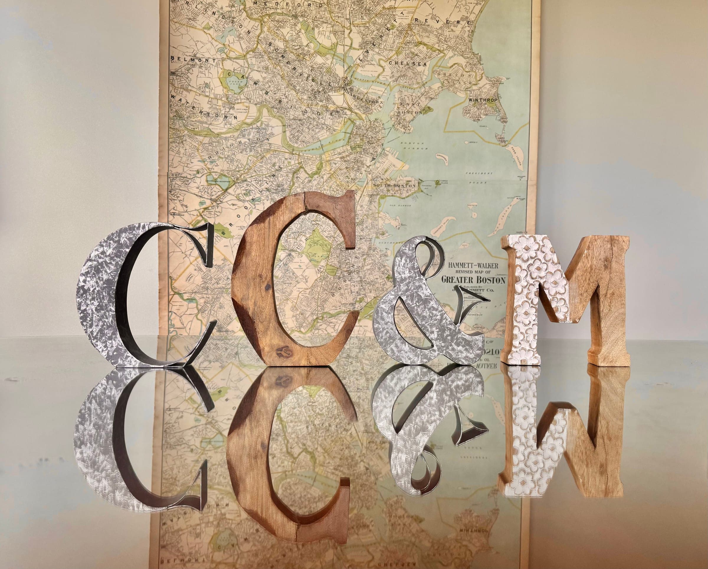 Decorative CC&M letters on a table