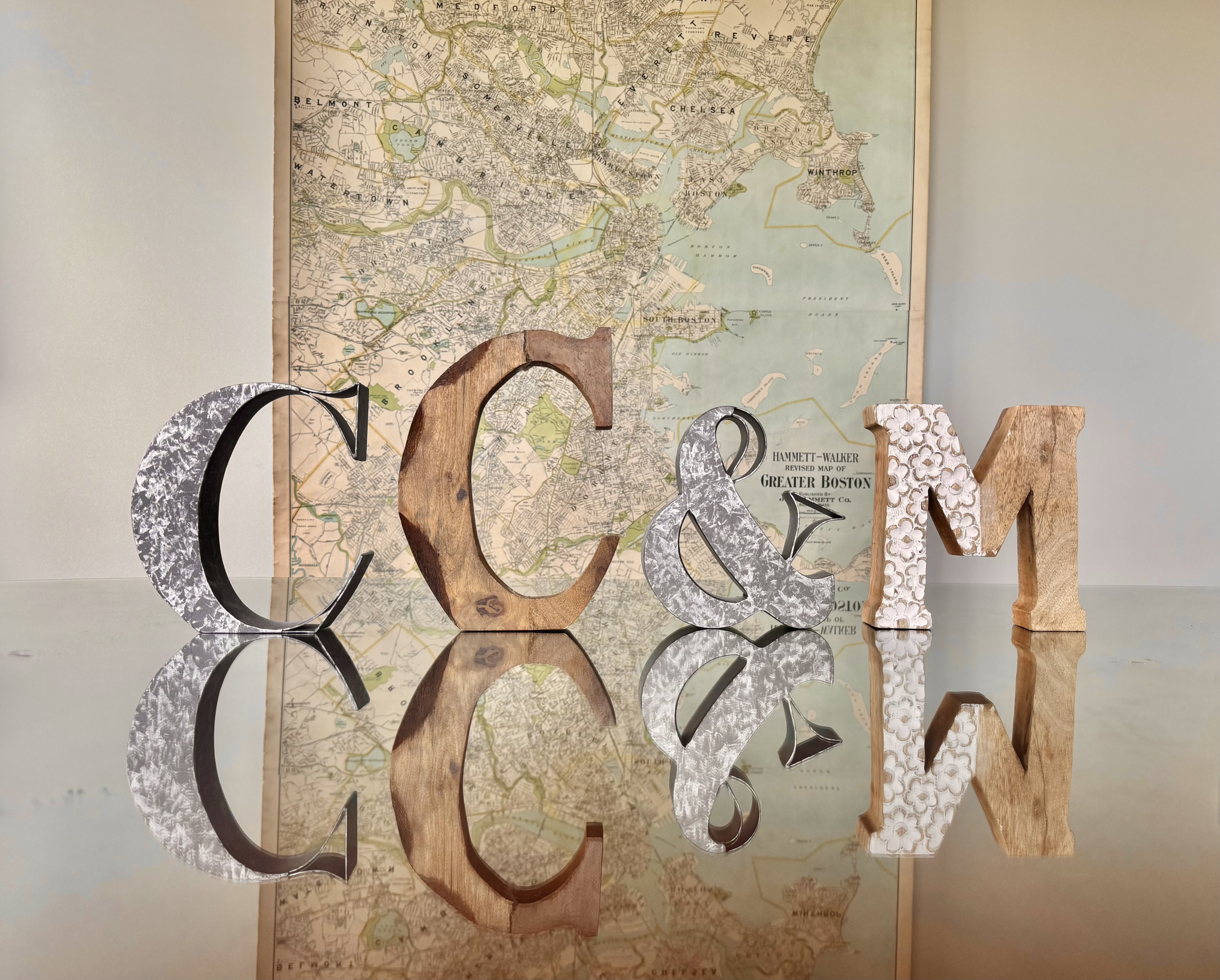 Decorative CC&M letters on a table